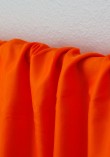 Tissu seconde main polyester orange